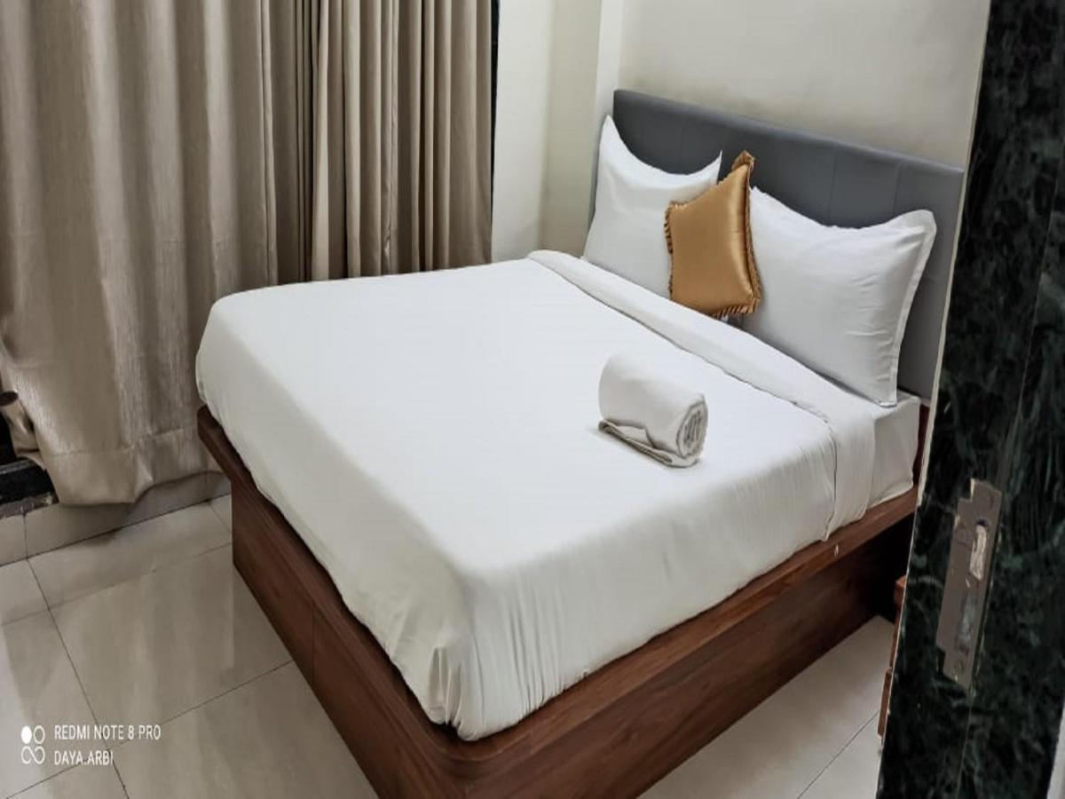 Hotel Satyam Residency ナビムンバイ エクステリア 写真